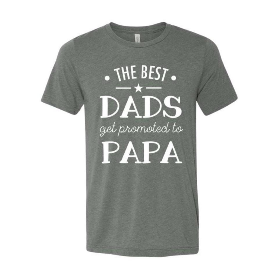 Best Dads Get Promoted to PAPA Shirts. Gray ringspun cotton tshirt with white lettering.  Father's Day and New Papa Tshirts. Pregnancy reveal shirts for papa. Little Gift Nook.
