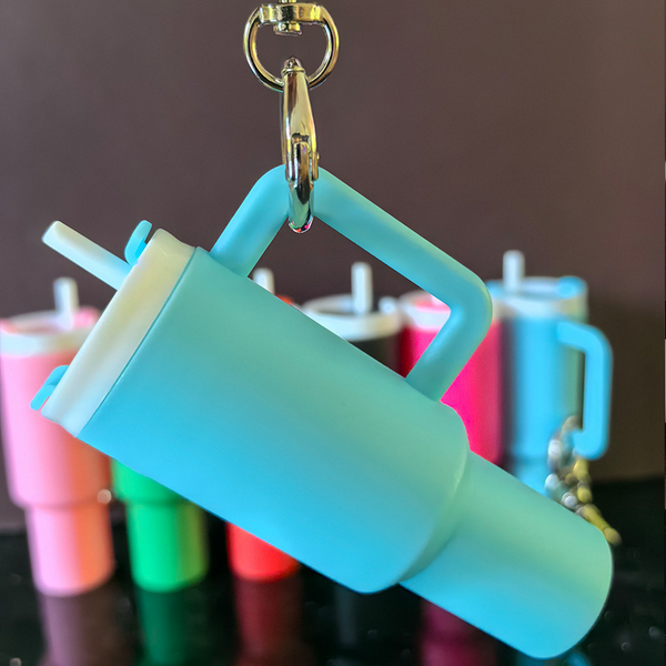 Mini Stanley inspired Tumbler Keychain. Lid screws off. Holds chapstick or small items. Multiple Colors. Metal keyring and lobster clip. Little Gift Nook.