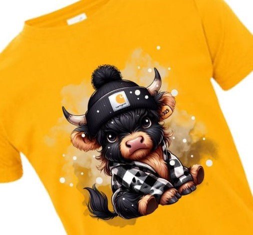 Toddler Highland Cow Moody Cow Tshirt in golden yellow. Short sleeve. Marygold yellow tshirt with little brown cow in black checkered flannel and beanie hat. Cow looks moody. Little Gift Nook.