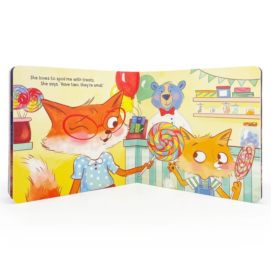 Inside Auntie and Me board book with 2 foxes at candy store.