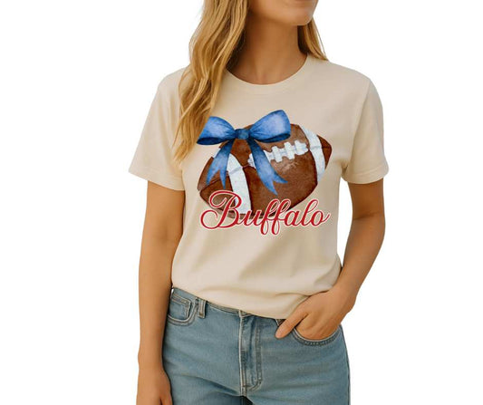 woman in cream tshirt with Buffalo Football Blue Bow PNG Digital Download image on front - Little Gift Nook