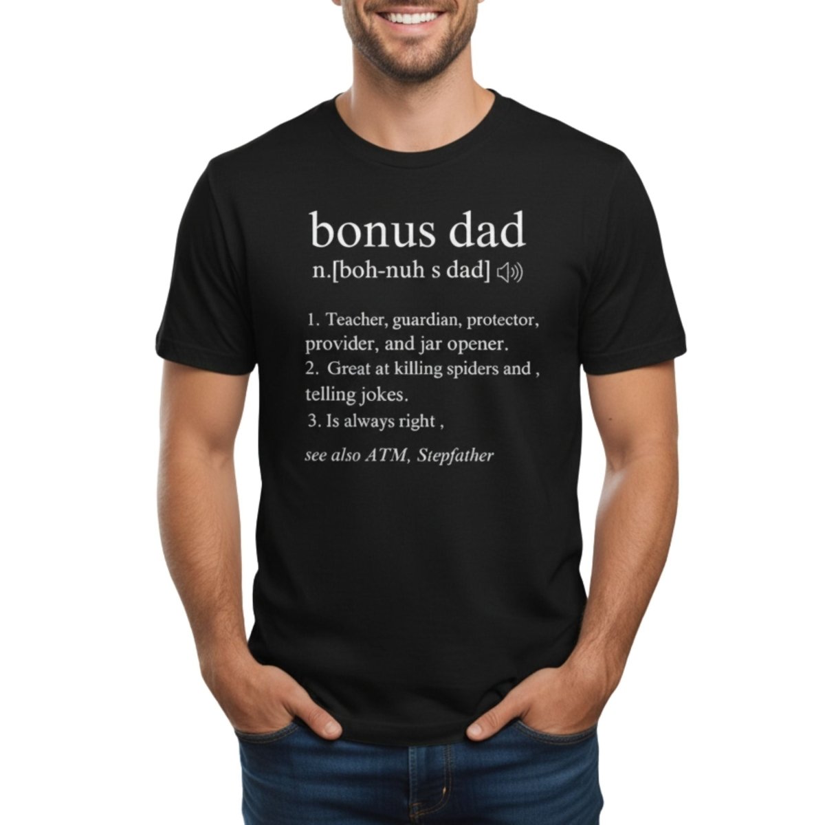 Man wearing black tshirt with white text "Bonus Dad" and description standing on white background. Little Gift Nook