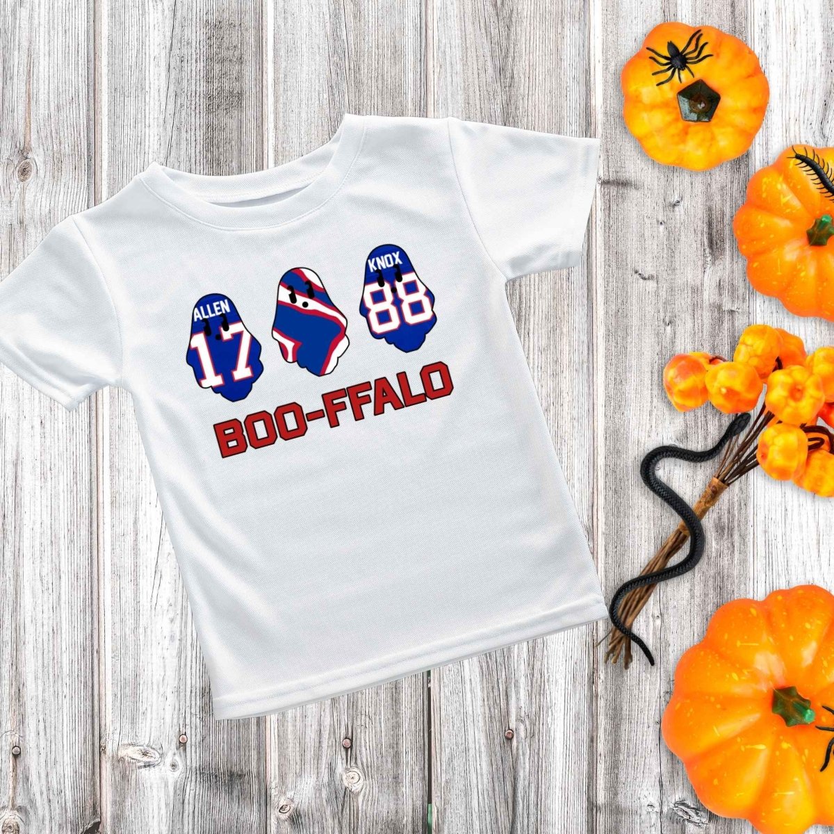 White royal blue and red ghost BOO-FFALO Buffalo football inspired tshirt for kids on wood background with pumpkins.