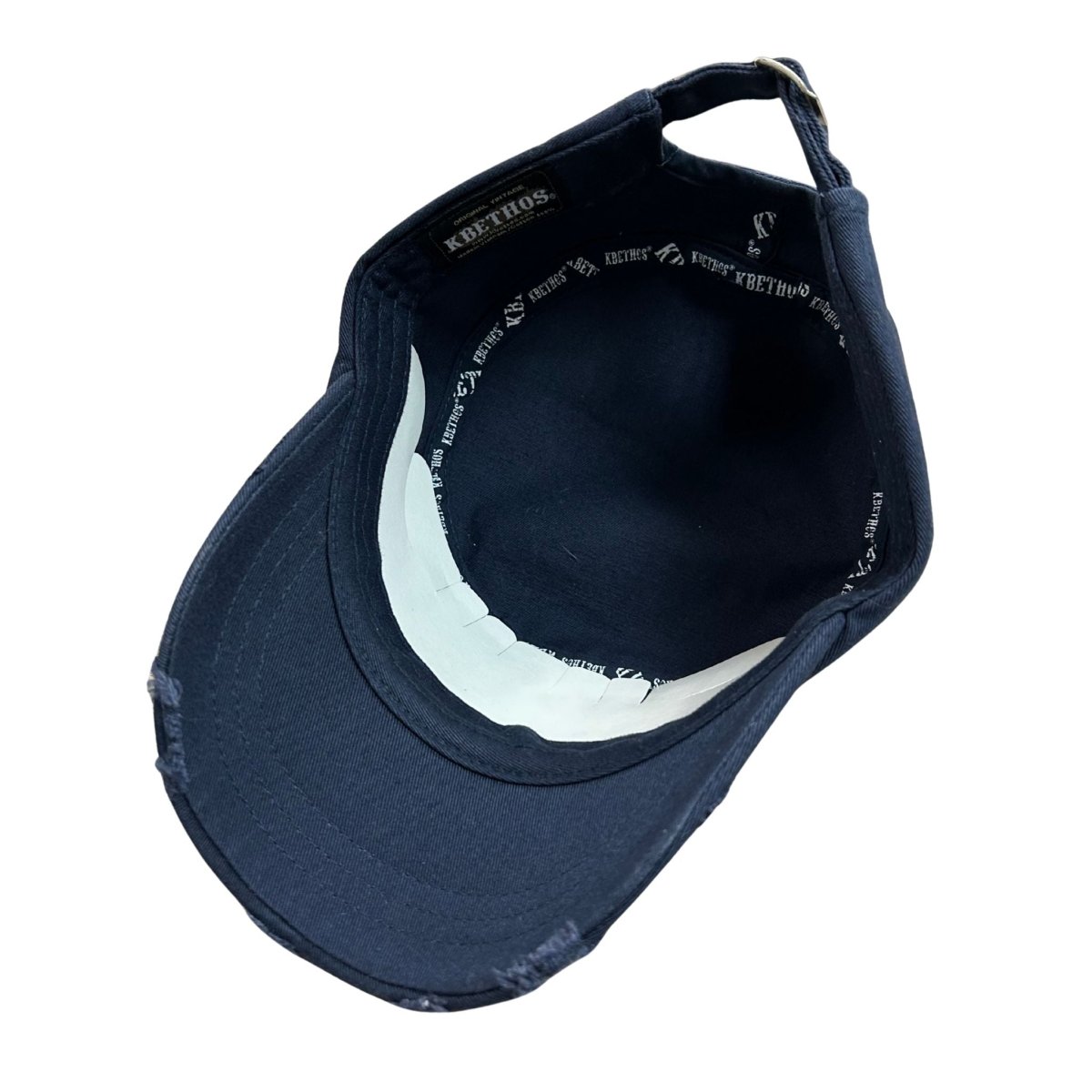 Lake Chautauqua navy cadet hat interior with adjustable back.