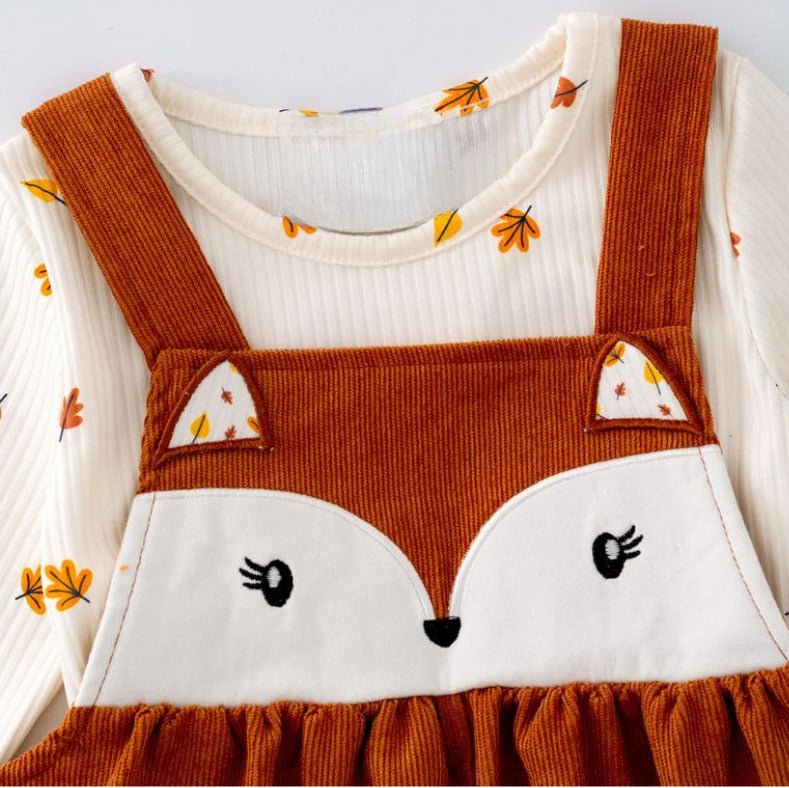 Close up of Girls corduroy fox Jumper Dress Set. comes with a cream orange & yellow leaf print long sleeve top.- Little Gift Nook