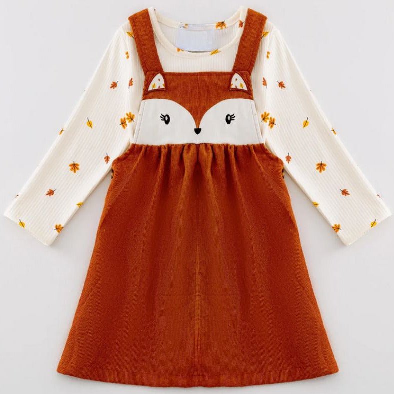 Orange corduroy fox face jumper dress with a cream orange & yellow leaf print long sleeve top.- Little Gift Nook