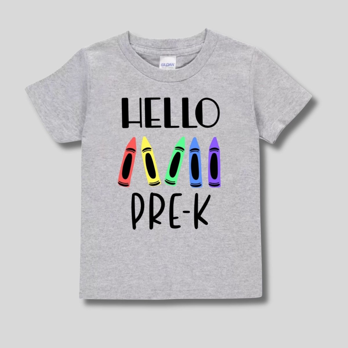 Gray t-shirt with colorful crayon illustrations and 'HELLO PRE-K' text on a gray background.