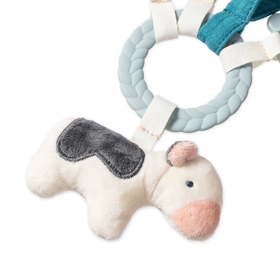 Close up of Itzy Ritzy Busy Ring Farm Teething Toy with silicone teether ring and plush jingle cow - Little Gift Nook