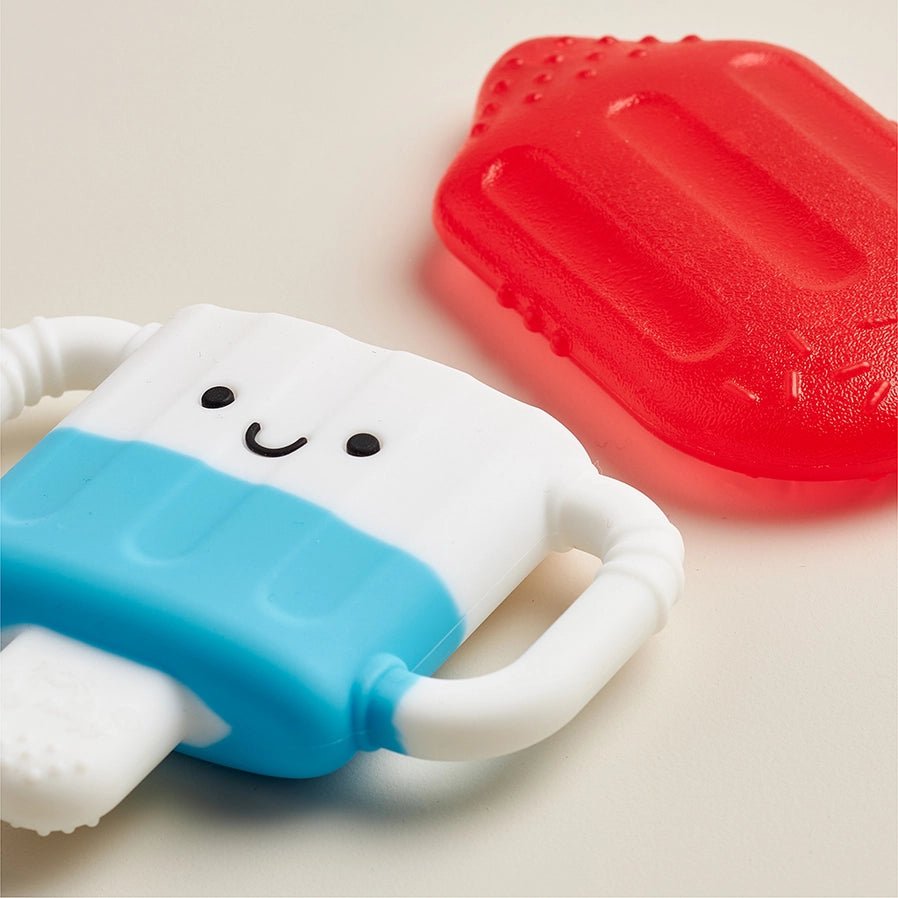 Itzy Cool Cold Baby Teether Hero Pop red white and blue like Popsicle with removable water filled top and silicone holder to keep baby hands from getting cold - Little Gift Nook