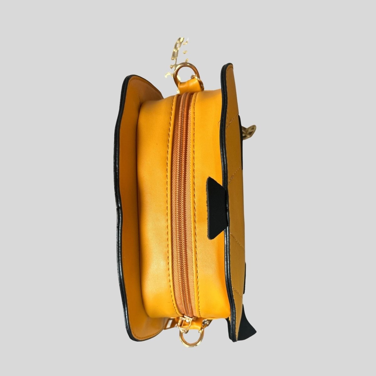 Jack-O-Lantern pumpkin purse top view. Zips open. chain strap is detachable.  Little Gift Nook.