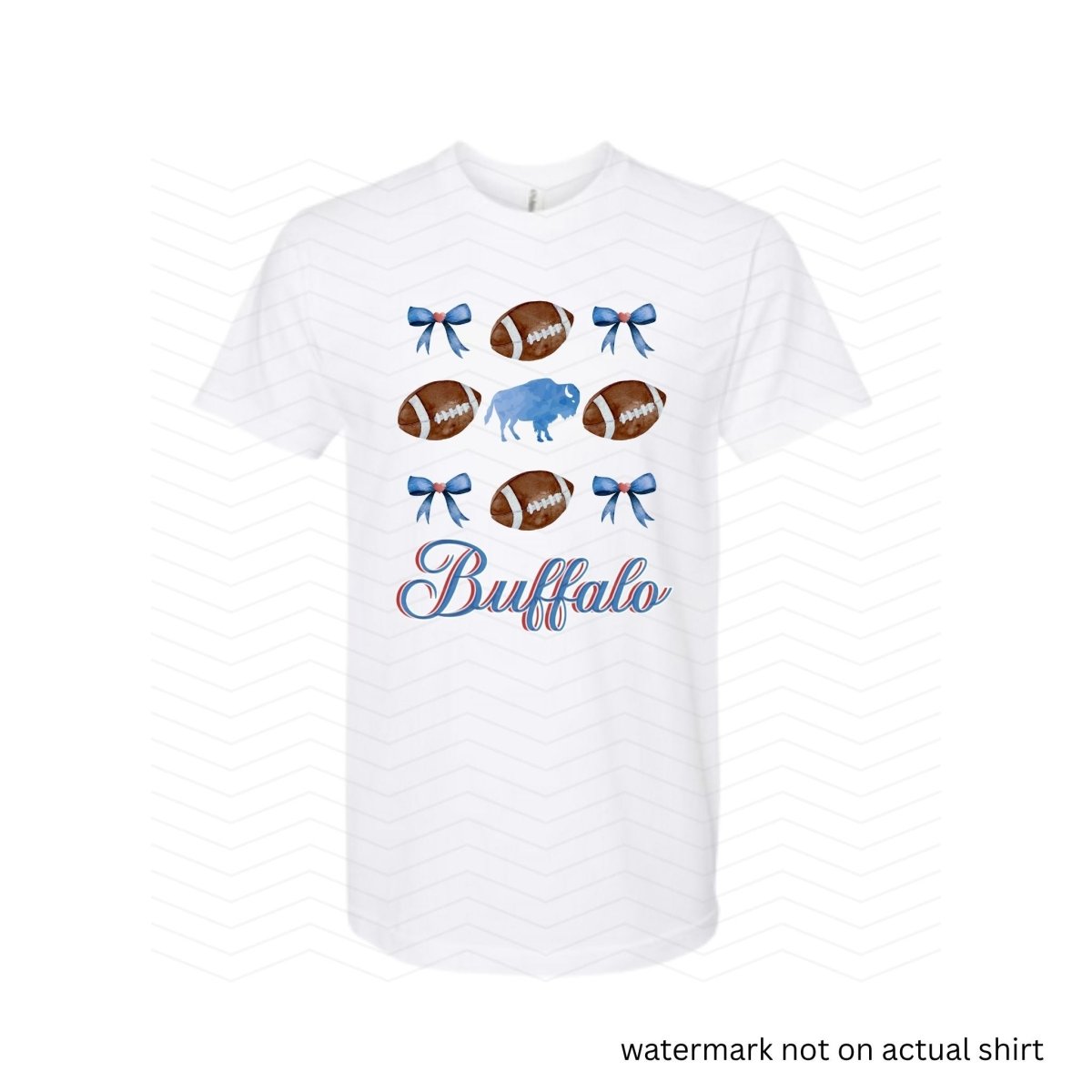 white tshirt with blue bows, buffalo, and brown footballs with the text Buffalo in cursive red & blue below image on front.