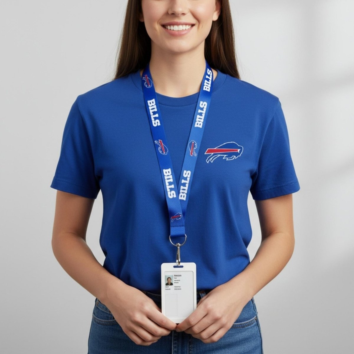 Woman wearing royal blue logo Buffalo Bills lanyard with attached keyring and clip to hold ID card.