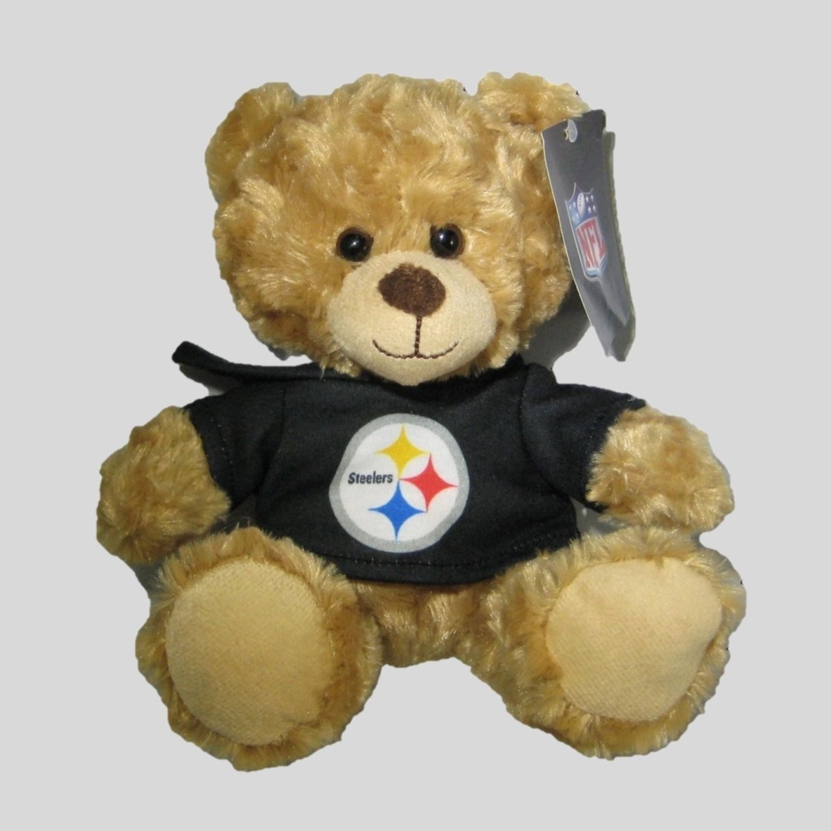 Plush teddy bear wearing a black hoodie shirt with a Steelers logo on a gray background. Little Gift Nook