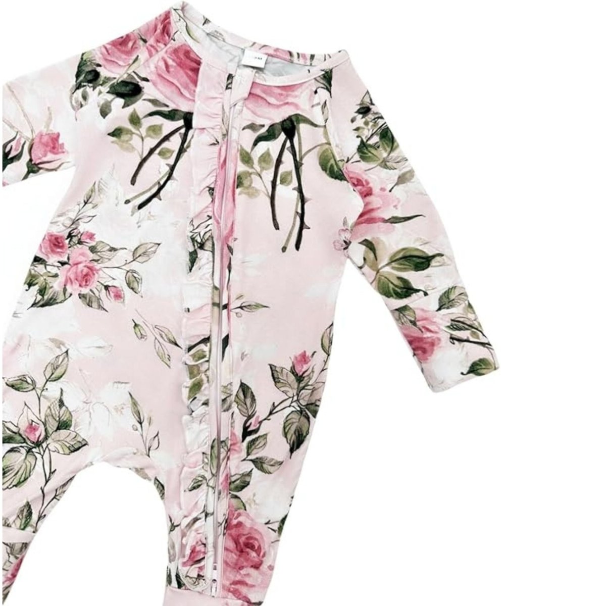 pink floral baby bamboo sleeper close up.