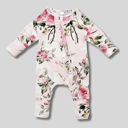 pink floral ruffle bamboo baby sleeper on gray background. Little Gift Nook