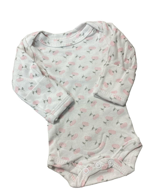 Preemie Baby bodysuit with floral pattern laying flat on a white background. Little Gift Nook