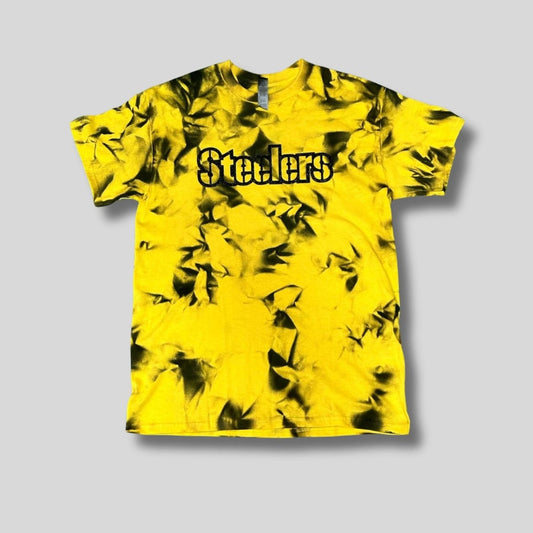 Yellow and black tie-dye t-shirt with 'Stealers' text in black glitter lettering on a gray background