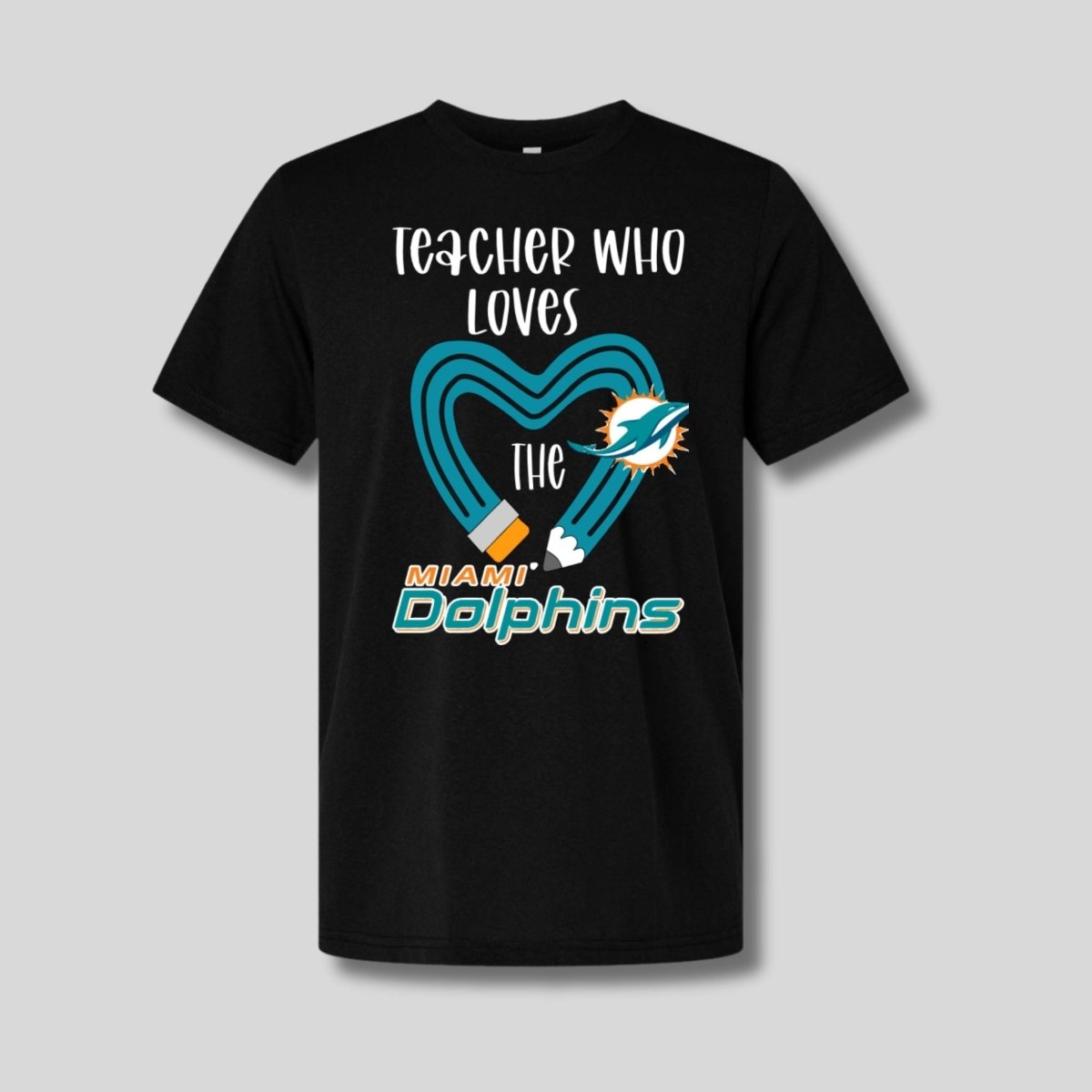 black tshirt with teal yellow heart pencil and "teacher who loves the dolphins" image on front.