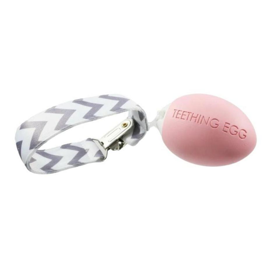 The Teething Egg Baby Teether in Pink with clip strap included. Made in USA.- Little Gift Nook