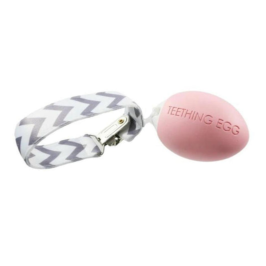 The Teething Egg Baby Teether in Pink with clip strap included. Made in USA.- Little Gift Nook