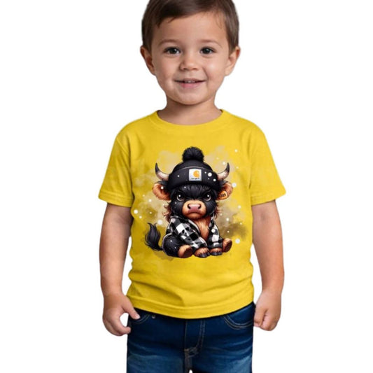 Little boy wearing yellow tshirt with black grown highland cow in flannel and beanie on front standing on white background.