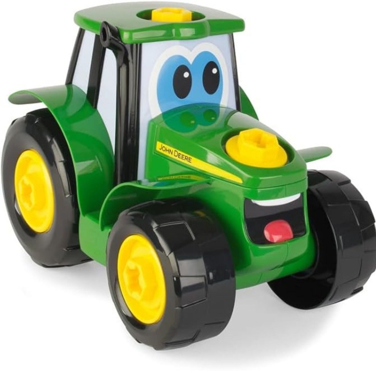 Close up of John Deere tractor toy put together sitting on white background.