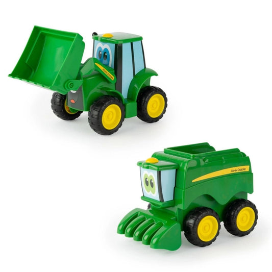 John Deere 2 pc set Scoop and Haul tractor toy vehicles sitting on white background. Little Gift Nook