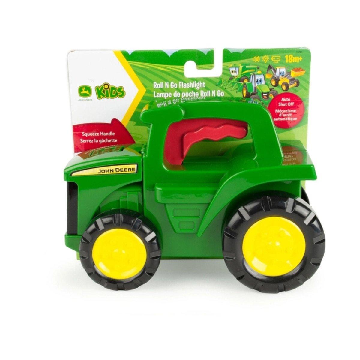 TOMY John Deere flashlight push n go tractor toy in package on white background.