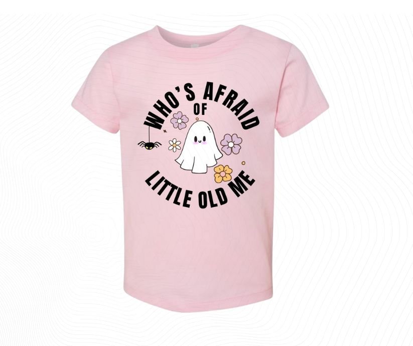 Pink t-shirt with ghost graphic and text "who's afraid of little me" .