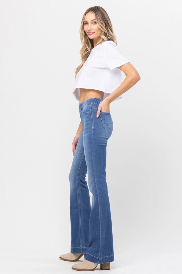 Women's Light Pull On Flare Jeans. Stretchy and a tall fit. side view with working real back pockets. - Little Gift Nook