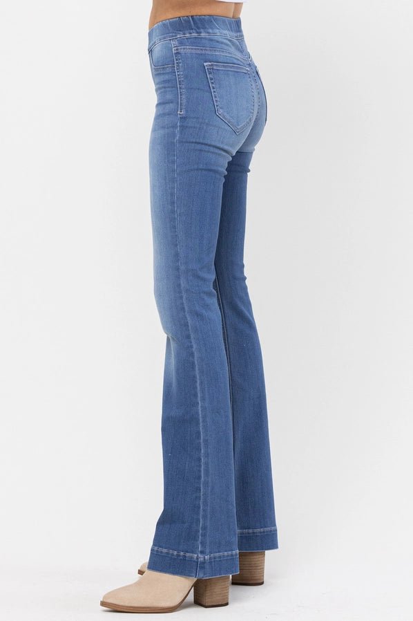 Women's Light Pull On Flare Jeans. Stretchy and a tall fit. Side view. Real back pockets. - Little Gift Nook