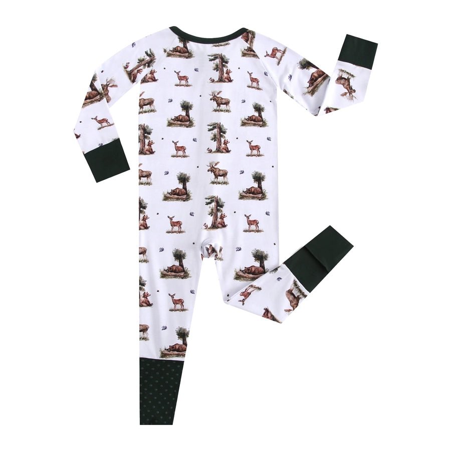 back view of white and forest green woodland forest animal print bamboo sleeper.