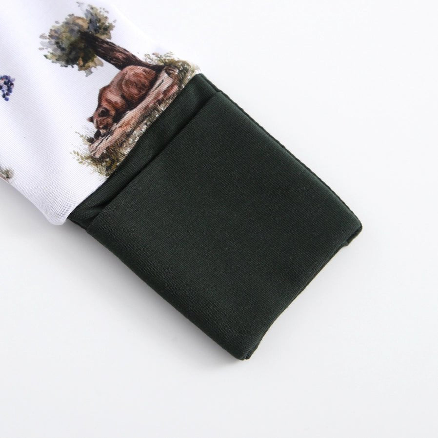 Close up of bamboo woodland animal baby sleeper fold over cuffs.