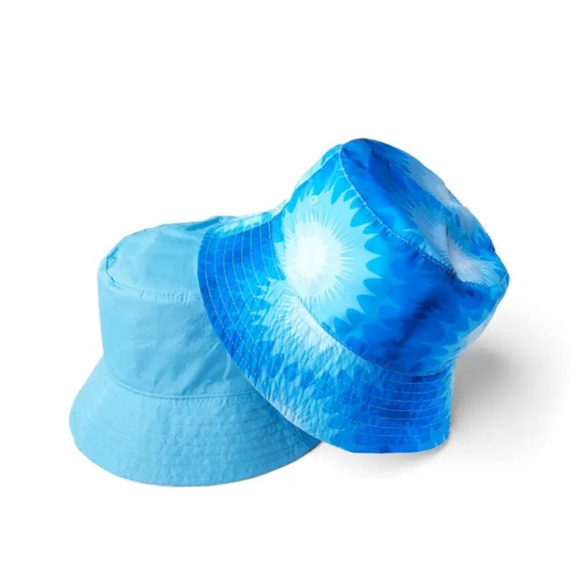 Child Reversible Bucket Hats in fun colors! Blue sun pattern reverses to solid light blue.- Little Gift Nook