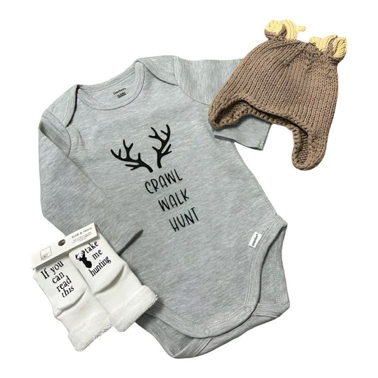 Crawl Walk Hunt Antler Baby Bodysuit. Gray bodysuit with black antlers and crawl walk hunt on front. Shown with knit buck hat and socks (not included). - Little Gift Nook