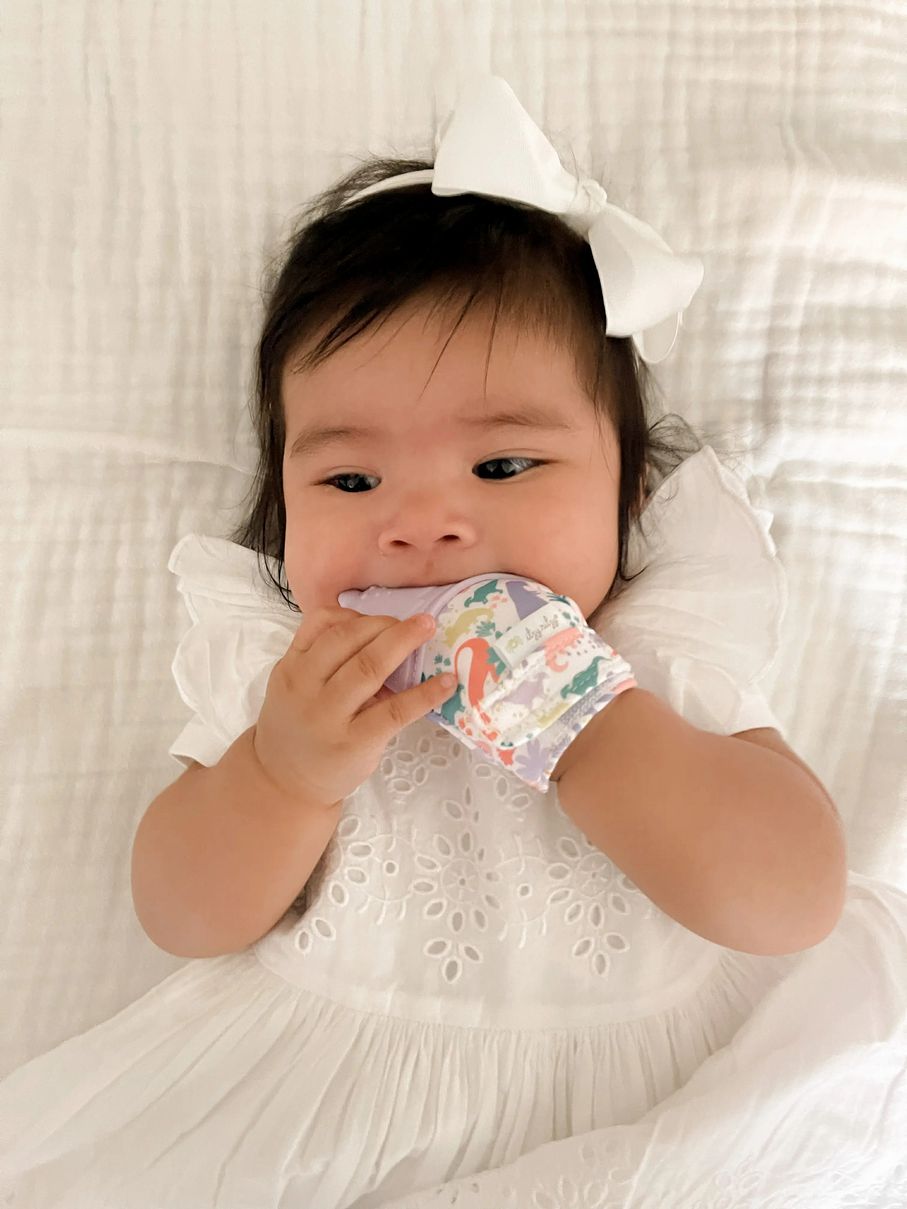 Itzy Ritzy Lilac Dino Itzy Mitt™ Silicone Teething Mitt - Little Gift Nook