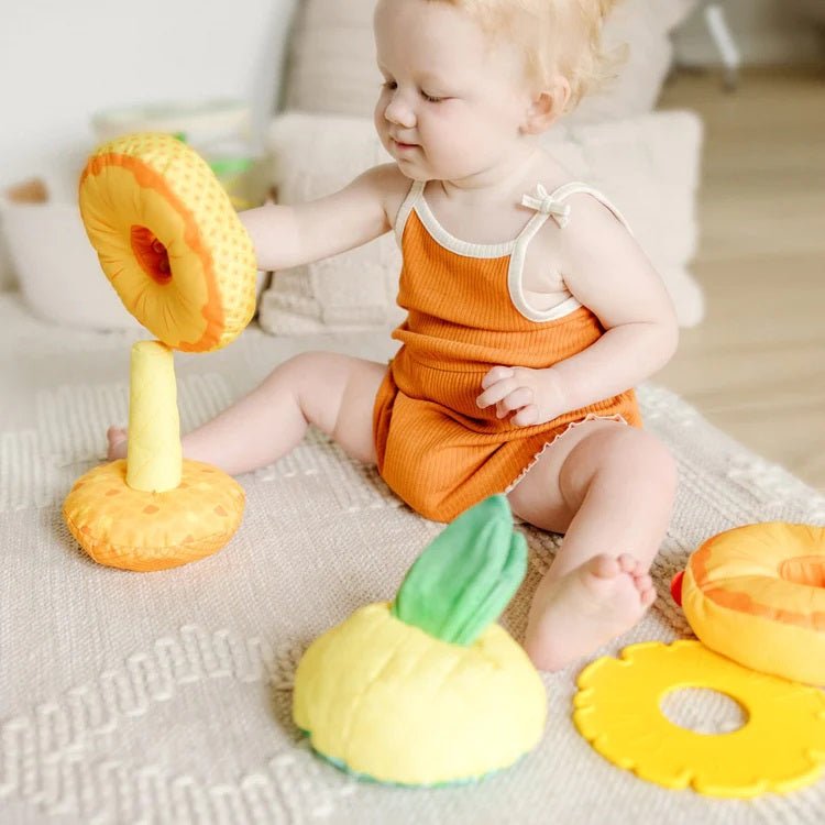 Melissa & Doug Pineapple Soft Stacker for baby. Baby stacking soft ring piece on base. - Little Gift Nook