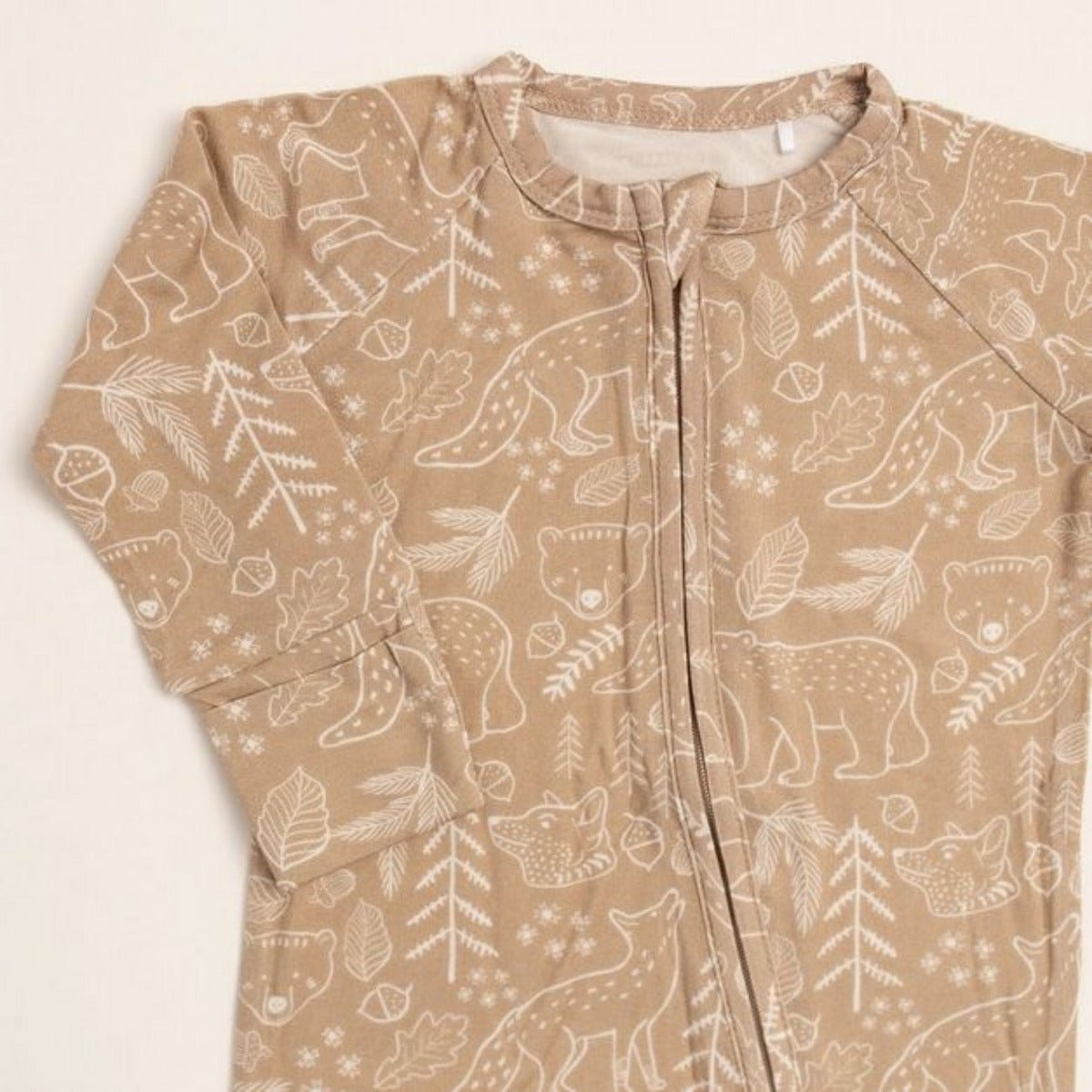 Woodland Animal Bamboo Baby Sleeper with fold over feet & hands. Close up of tan white print. - Little Gift Nook
