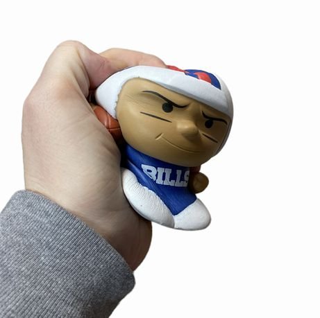 Buffalo Bills Jumbo Squeezy Josh Allen Football Player 5" showing it being squished. - Little Gift Nook