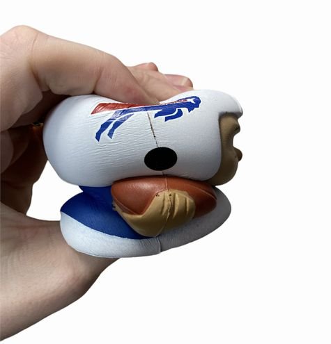 Buffalo Bills Jumbo Squeezy Josh Allen Football Player 5" being squished by hand. Slow rises back - Little Gift Nook