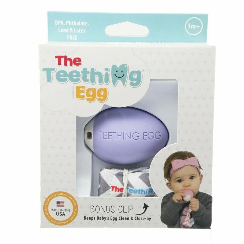 The Teething Egg Baby Teether in Lavender in box. Comes with bonus clip strap and is made in USA. - Little Gift Nook