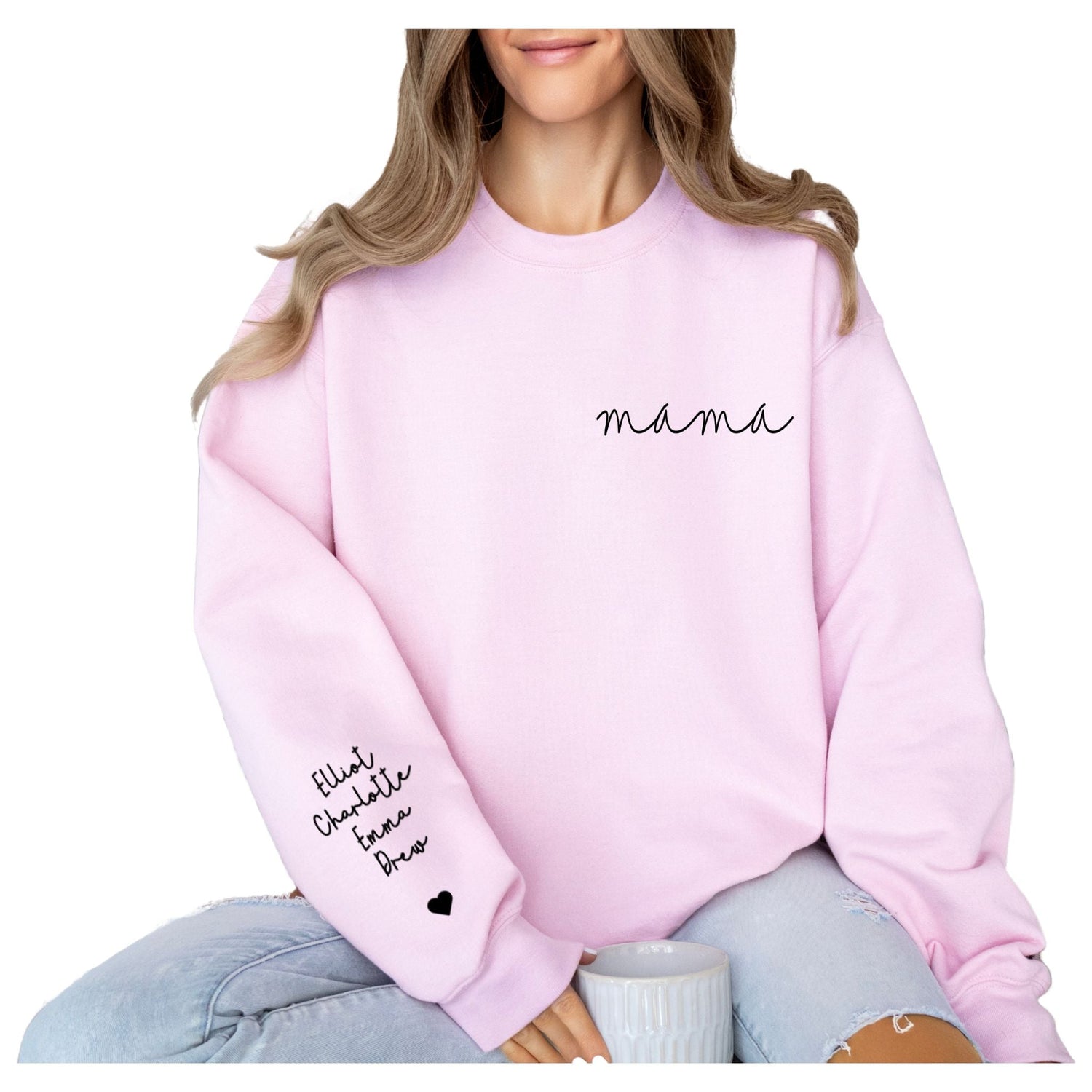 woman in pink sweatshirt with mama on front and names on sleeve.