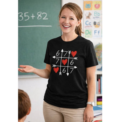 woman wearing funny black valentines day xo style 67 tshirt in classroom background. Little Gift Nook