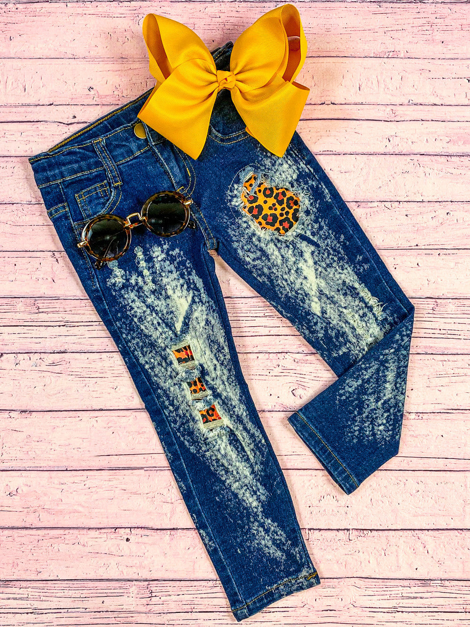 Animal Print Patch Denim Girls Jeans. Yellow black orange animal print peek through patch jeans. Little Gift Nook.