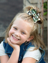 Load image into Gallery viewer, Camo &amp; Glittery Bow. Alligator Clip at back. Little Gift Nook.