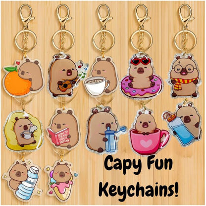 Capybara Acrylic Keychains. 12 different capybara theme keychains. Metal keyring and clip. Little Gift Nook.