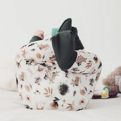 Forest Friends Bamboo Sleeper with fold over feet & hands. Cream & forest green fold over hands & feet. shown on model with feet turned over. Double zipper. Soft & Stretchy. Little Gift Nook.