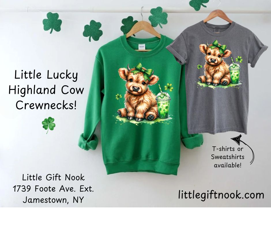 Lucky Highland Cow St. Patty's Crewnecks & Tshirts. Irish Green Fleece lined crewneck or Pepper Gray Short sleeved Tshirt with adorable Highland cow, clovers, green bow, and shamrock drink.  Utterly Cute!  Little Gift Nook.