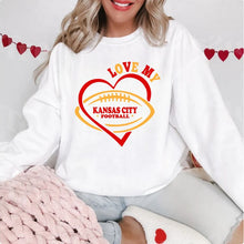 Load image into Gallery viewer, Love My Kansas City Chiefs Sweatshirt. White fleece lined crewneck sweatshirt. Red &amp; Yellow hearts and Love My Kansas City Football on front.  Little Gift Nook.