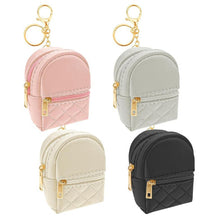 Load image into Gallery viewer, Mini quilted backpack keychains. 2 pockets that open. 4 colors to choose from: pink, gray, cream, or black. Has gold zippers and gold keyring, chain, and lobster cilp. Carry small items like chapstick, money, mints, and more! Little Gift Nook.